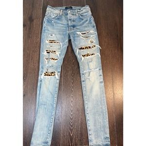 AMIRI CLAY &INDIGO LEOPARD DISTRESSED THRASHER JEANS